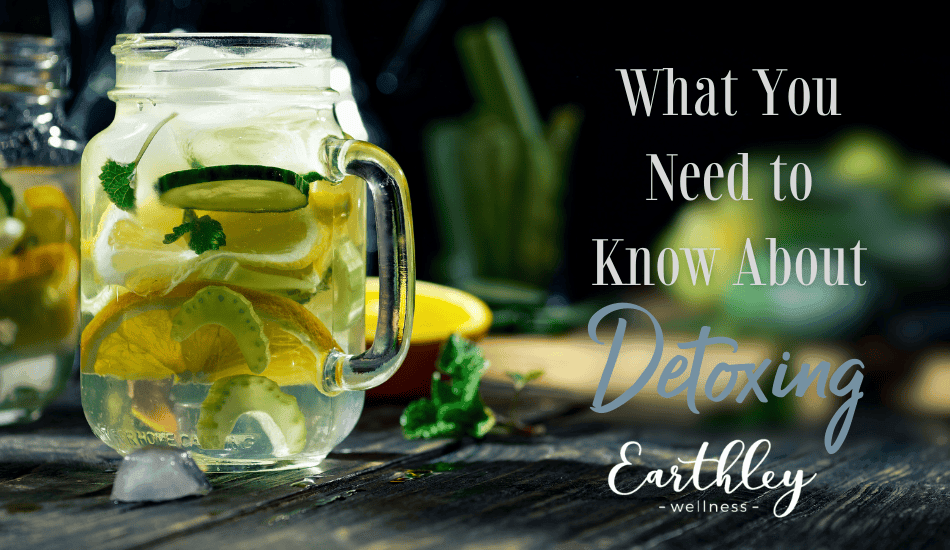 What You Need to Know About Detoxing blog header with lemon water in mason jar