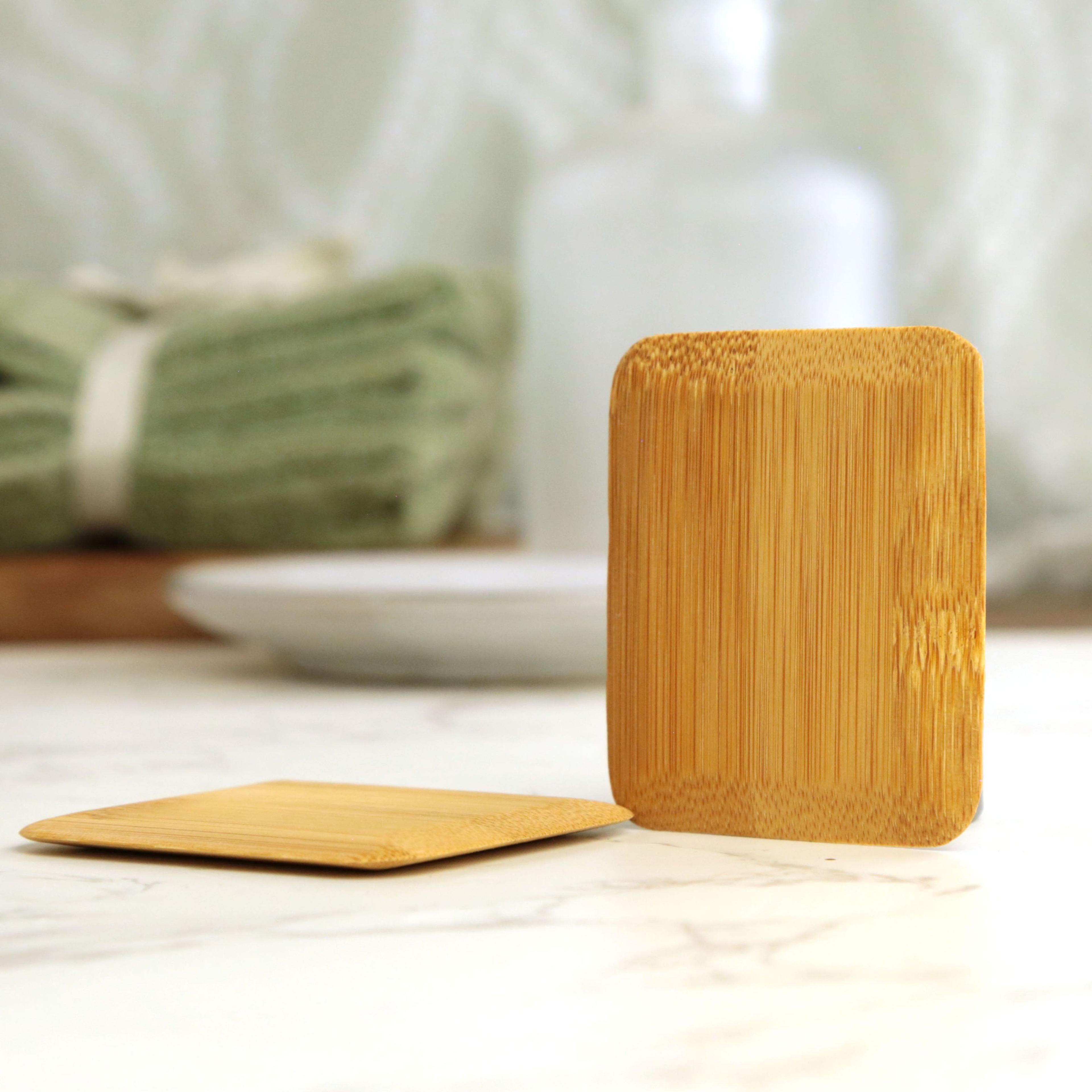 Earthley Bamboo Dish Scraper showing both front and side views of natural bamboo kitchen scraping tool on marble surface