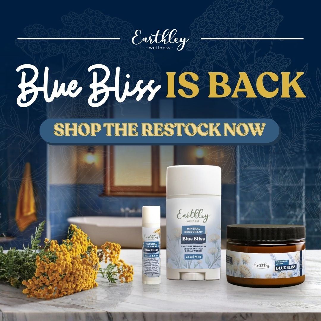 Blue Bliss natural deodorant products restocked - lip balm, mineral deodorant stick, and lotion with yellow yarrow flowers