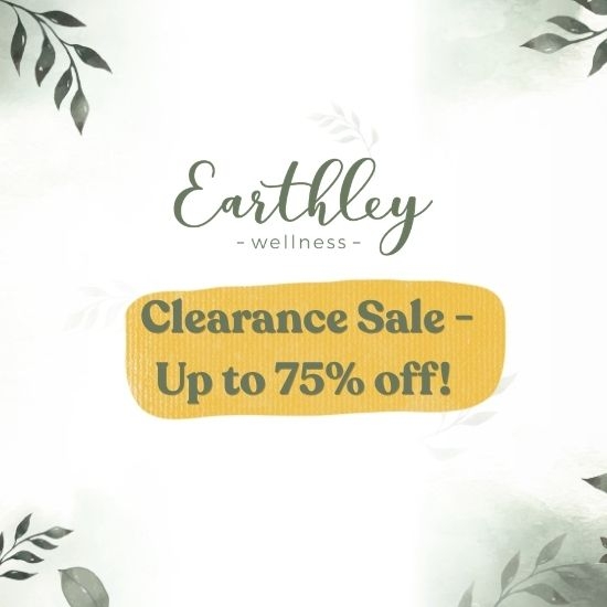 Earthley Wellness clearance sale banner with yellow brush stroke announcing up to 75% off, decorated with green botanical leaves