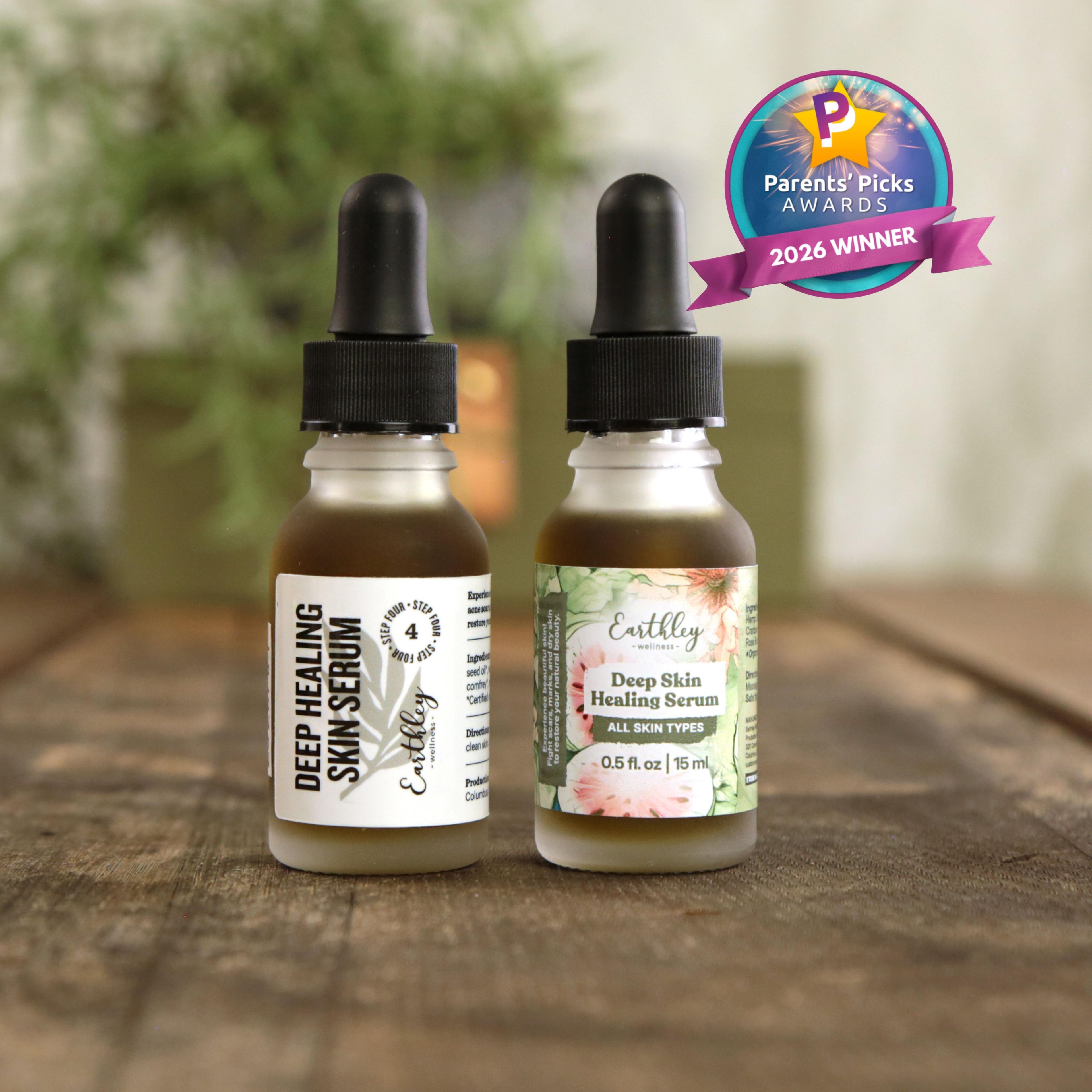 Two Earthley Deep Skin Healing Serum bottles with droppers on wooden surface, featuring Parents' Picks Awards 2026 Winner badge