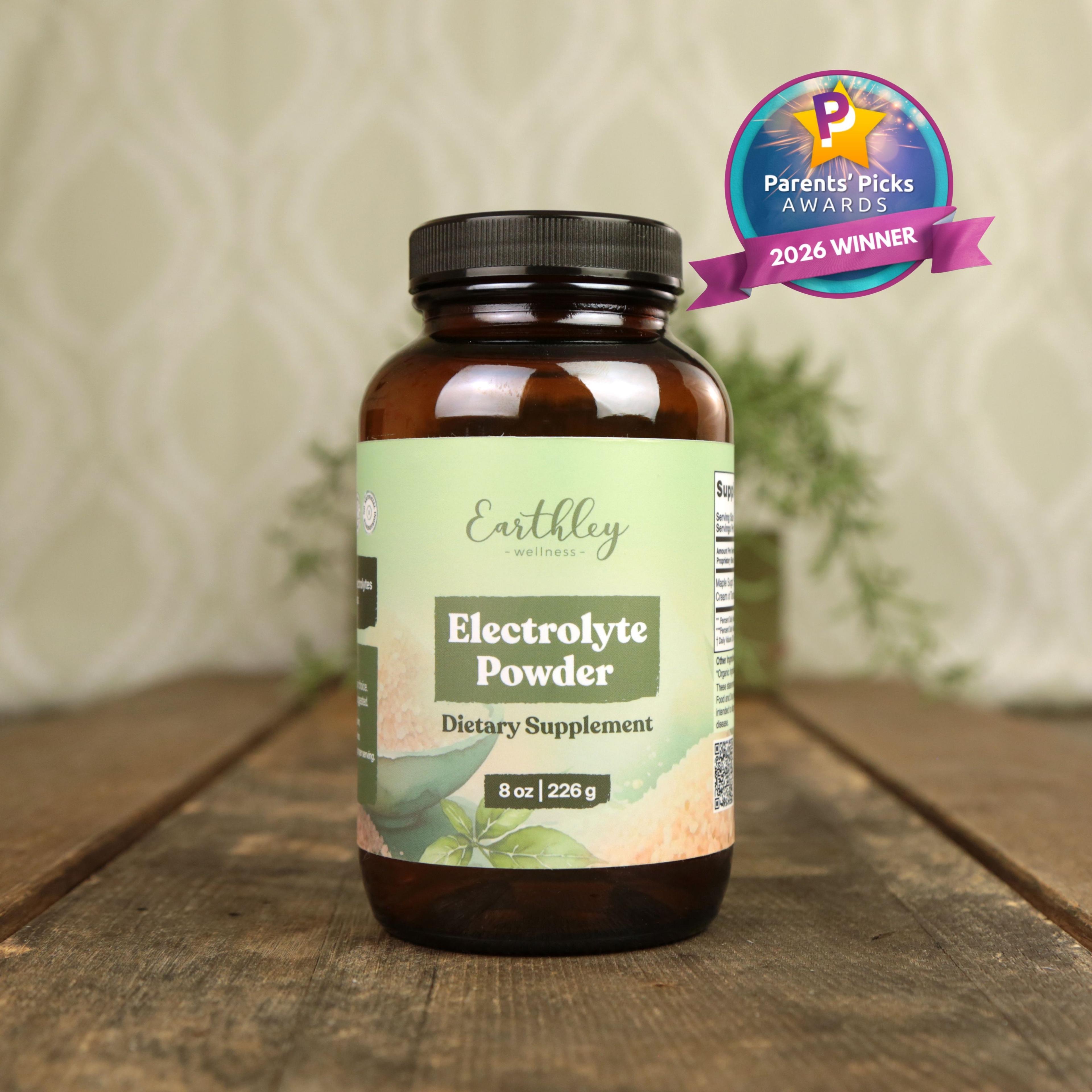 Earthley Electrolyte Powder supplement jar with green botanical label and Parents' Picks 2026 Winner award badge