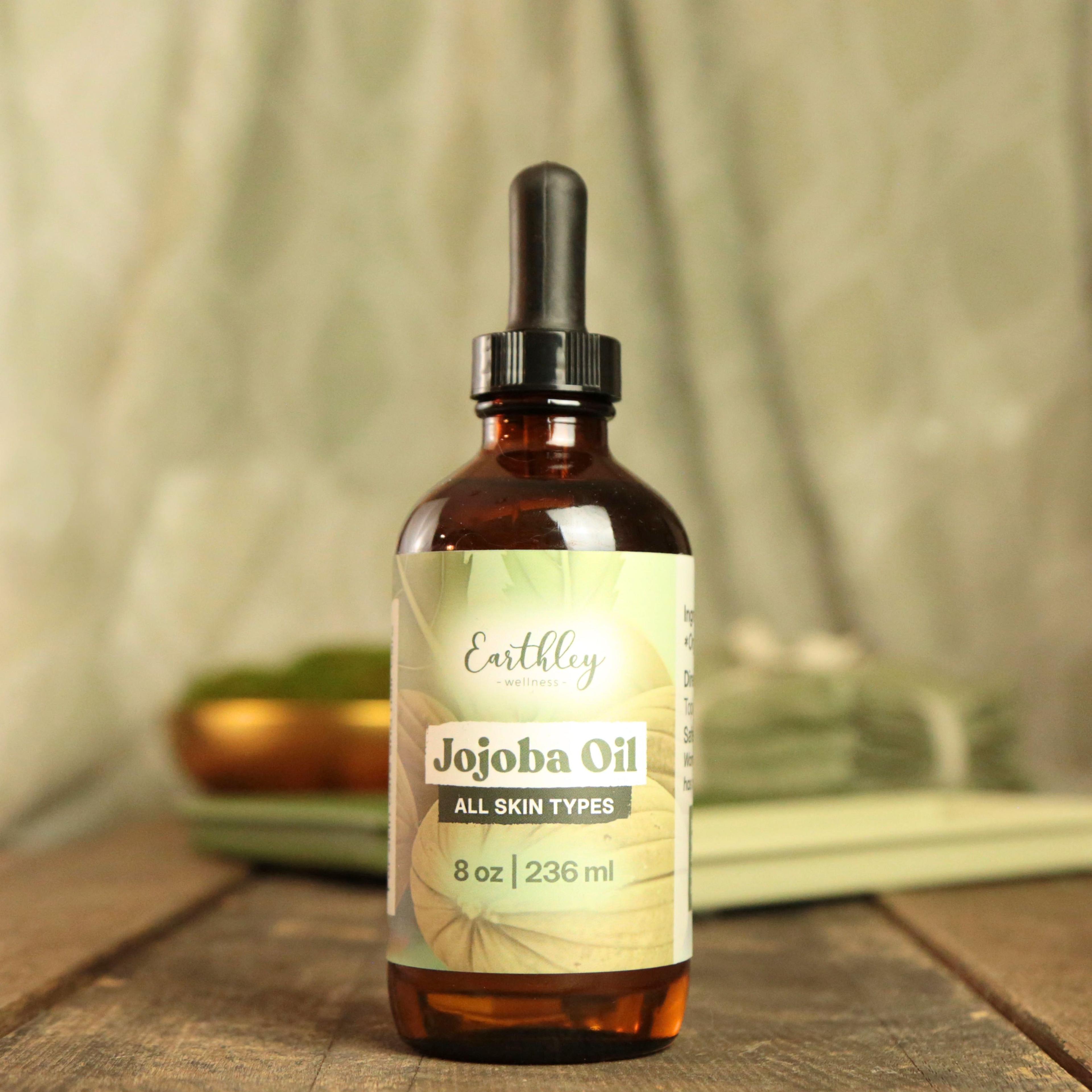 Earthley Wellness Jojoba Oil 8oz amber dropper bottle for all skin types