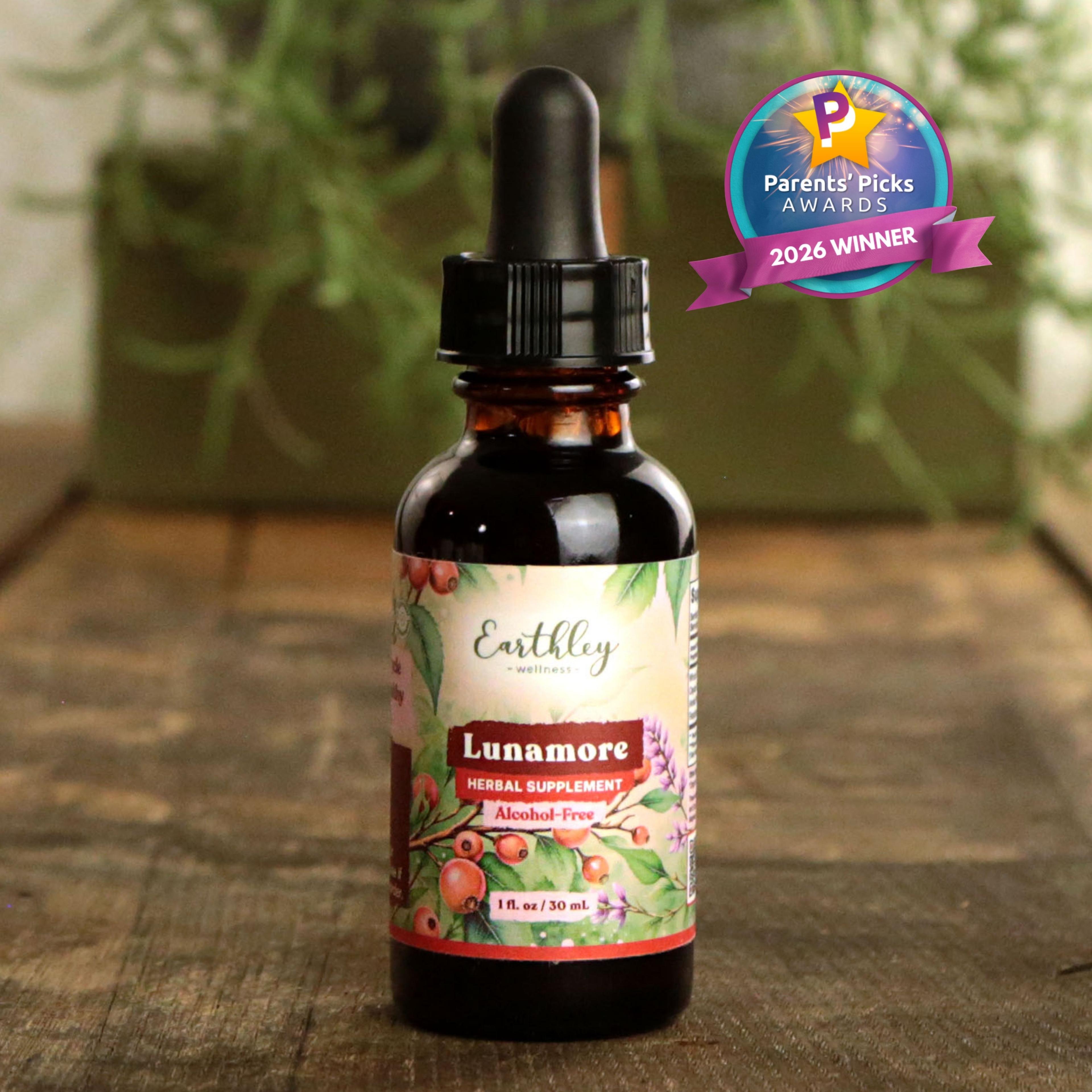 Earthley Lunamore herbal supplement bottle with dropper, featuring botanical label design and Parents' Picks 2026 Winner award badge