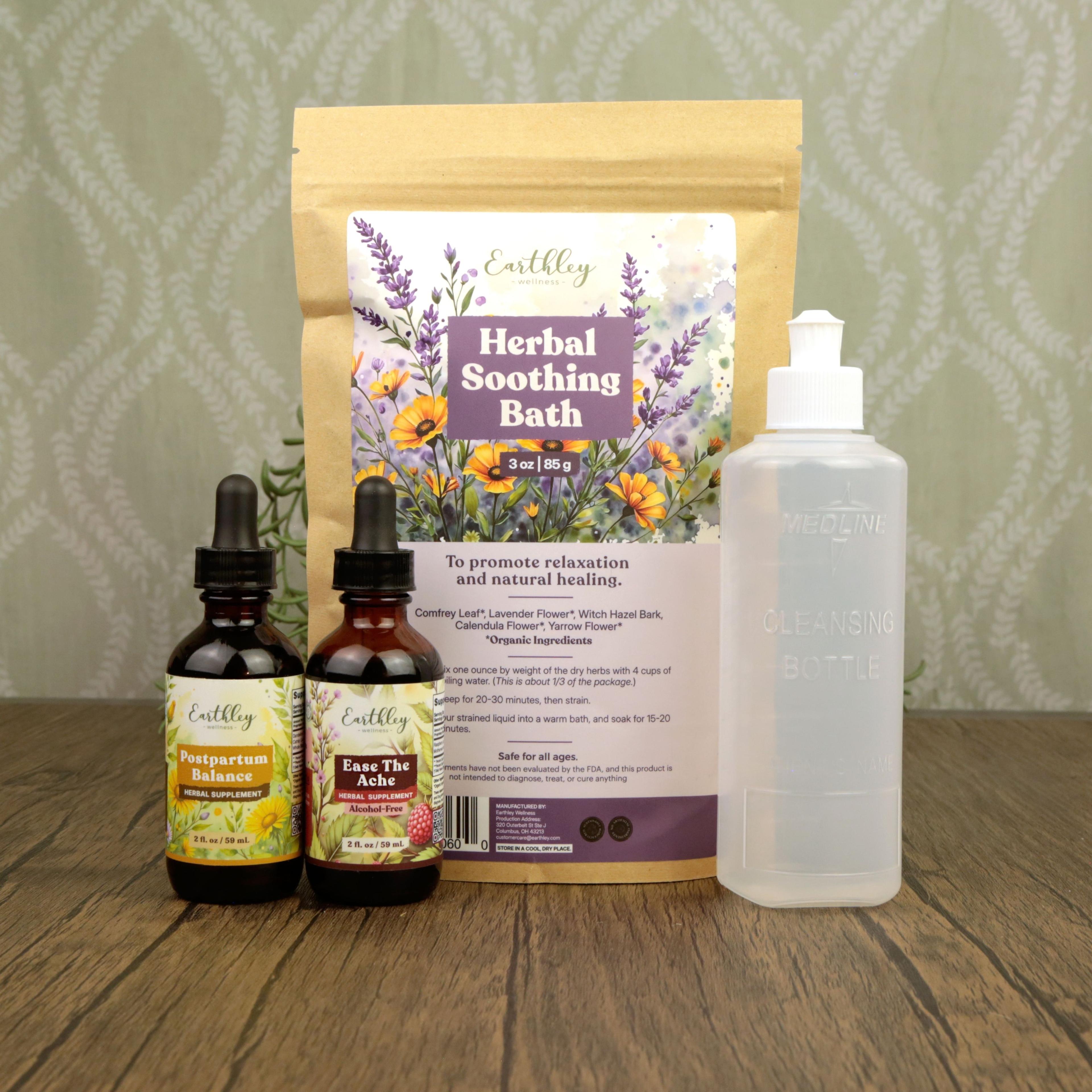 Earthley wellness products: Postpartum Balance tincture, Ease The Ache tincture, Herbal Soothing Bath, and pump bottle on wood surface