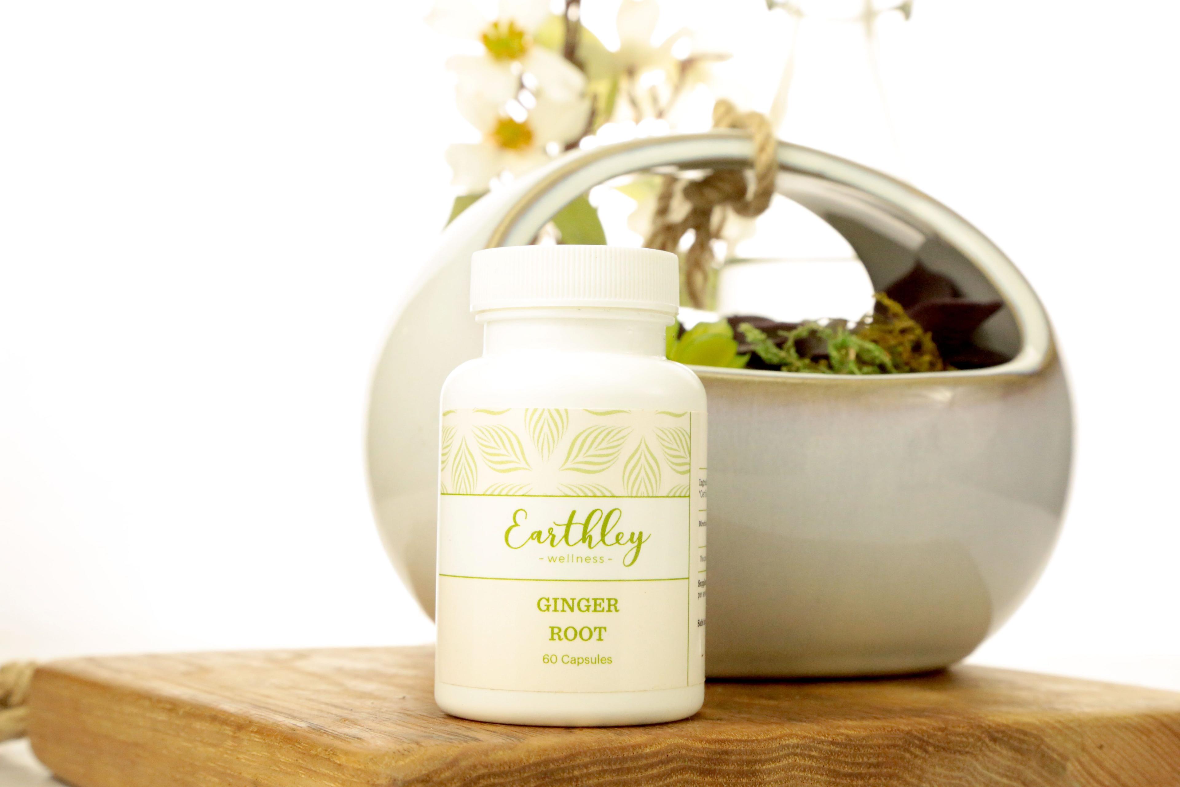 Earthley Ginger Root Capsules amber bottle with orange ginger label for digestive and nausea support