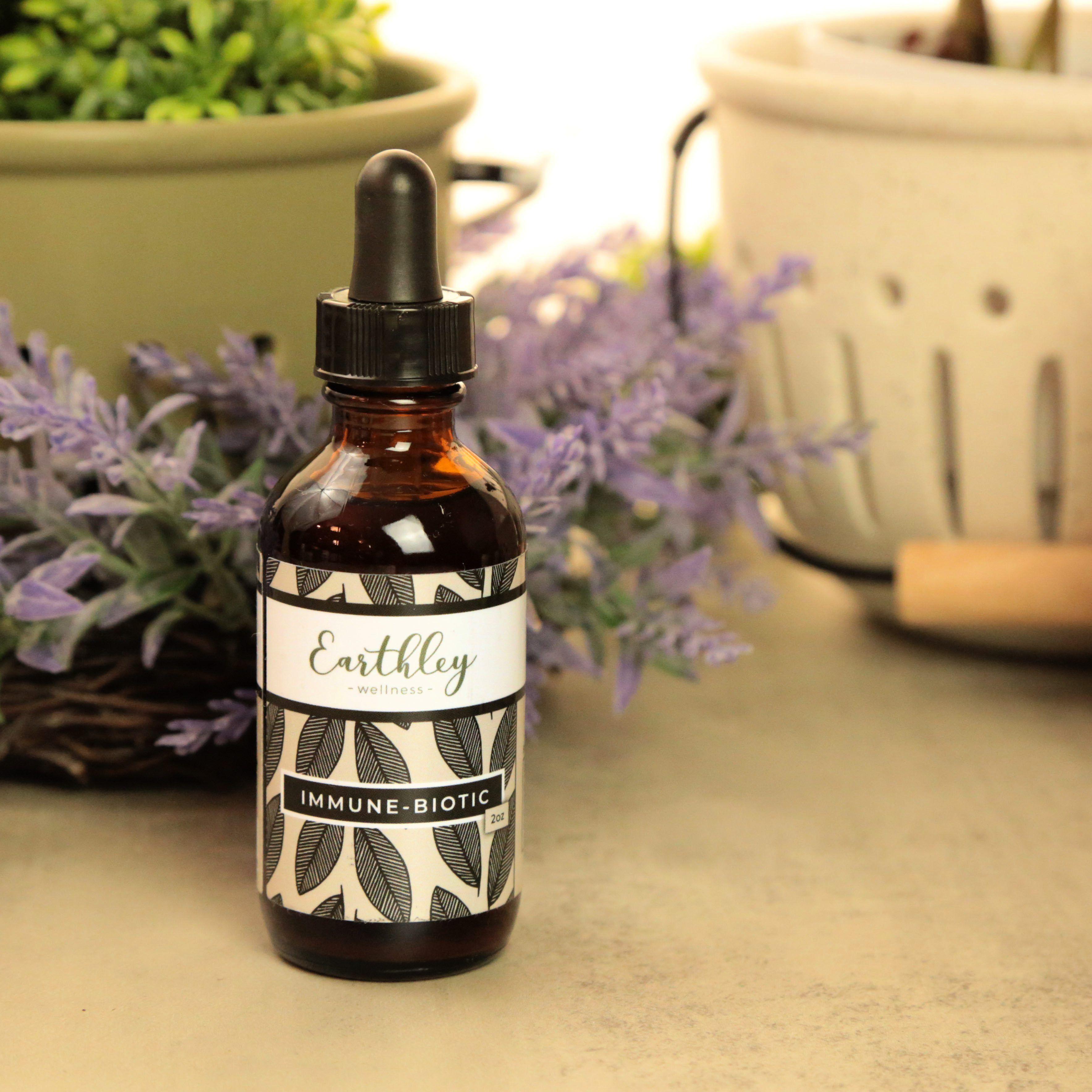 Earthley Immune Biotic Herbal Extract amber glass dropper bottle with botanical label