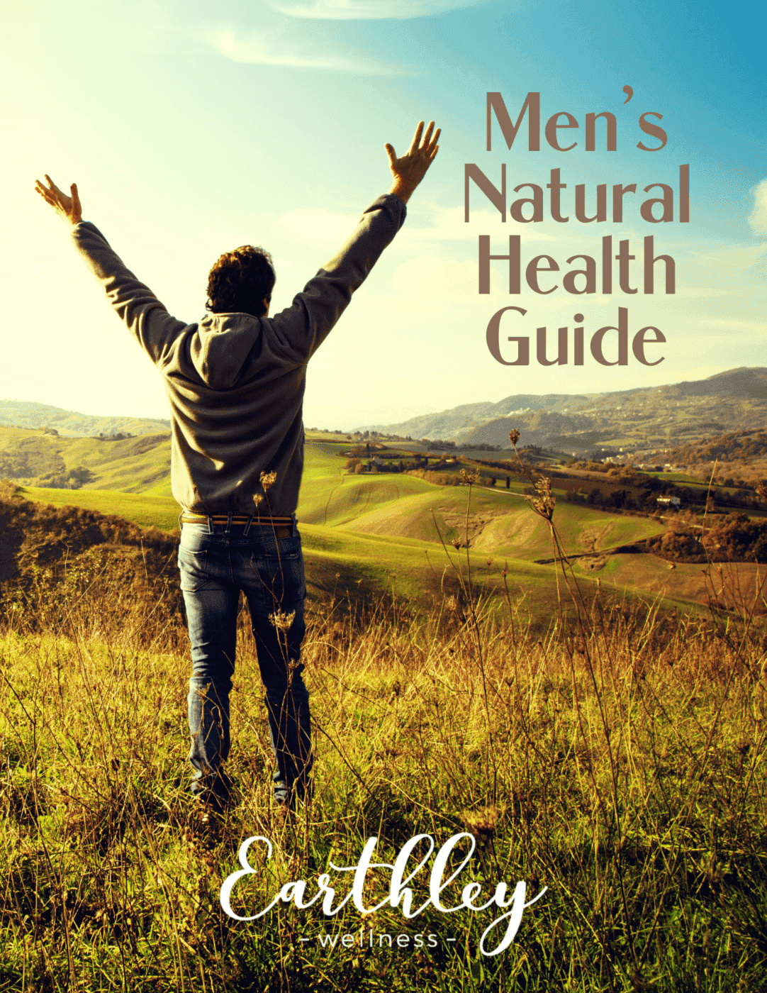 Cover of Men's Natural Health Guide featuring man with arms raised overlooking rolling green hills at sunset with Earthley logo