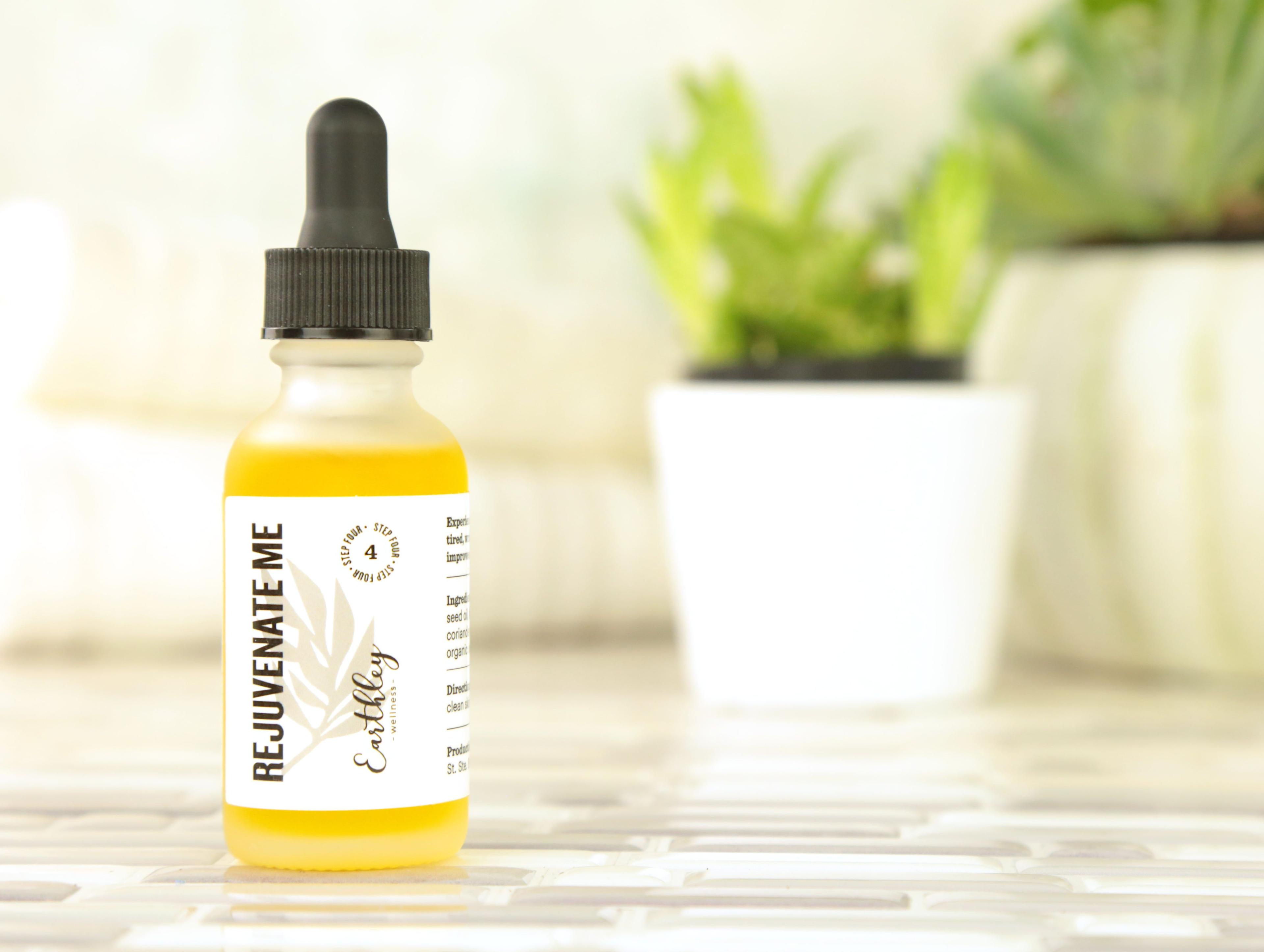 Rejuvenate Me facial serum in frosted dropper bottle Step 4 skincare with plants