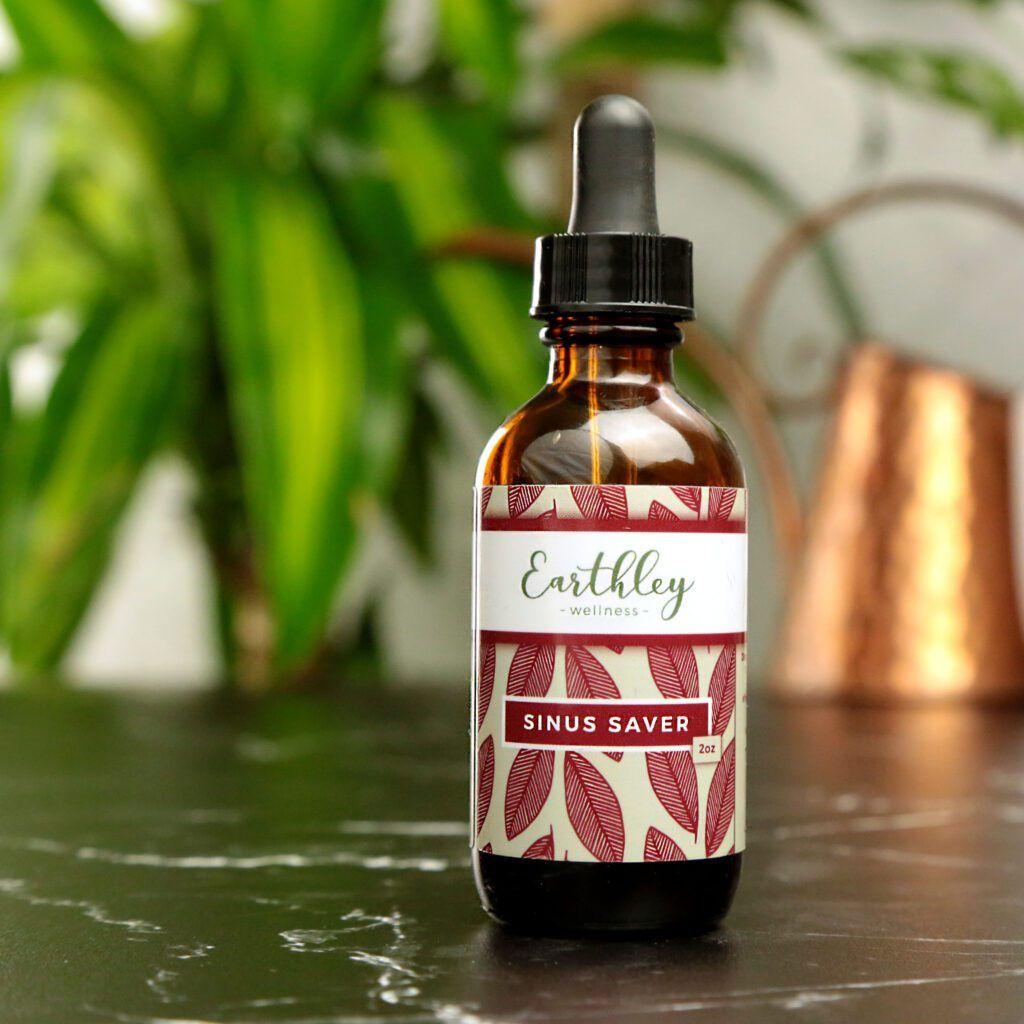 Sinus Saver herbal extract in amber dropper bottle with red leaf label