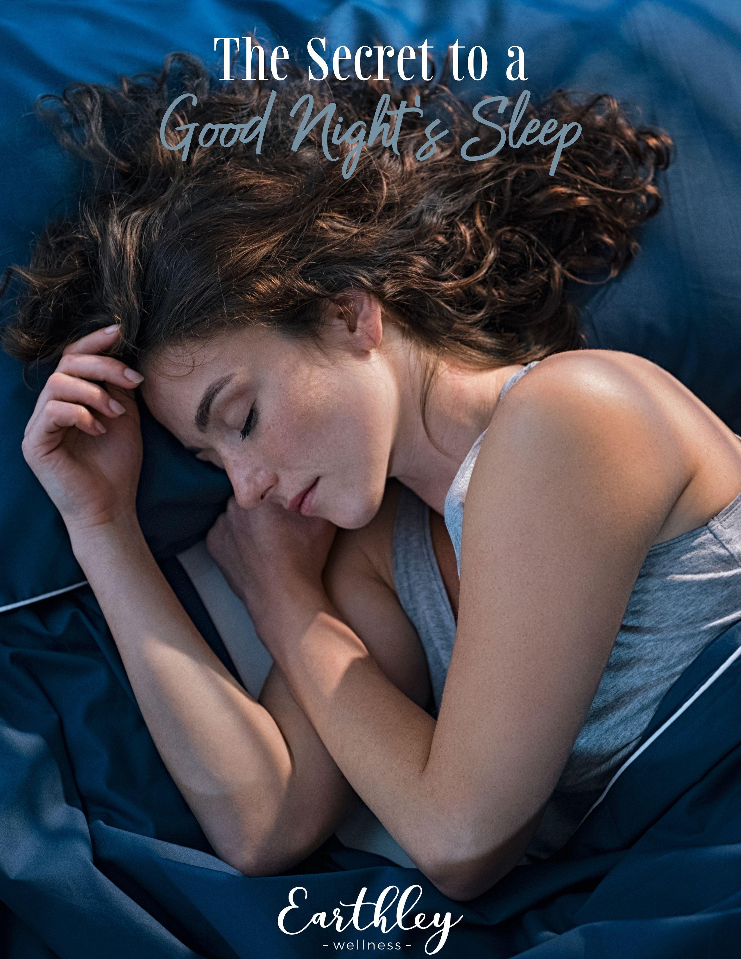 The Secret to a Good Night's Sleep guide cover showing woman with curly brown hair sleeping peacefully on navy blue bedding, Earthley Wellness logo at bottom