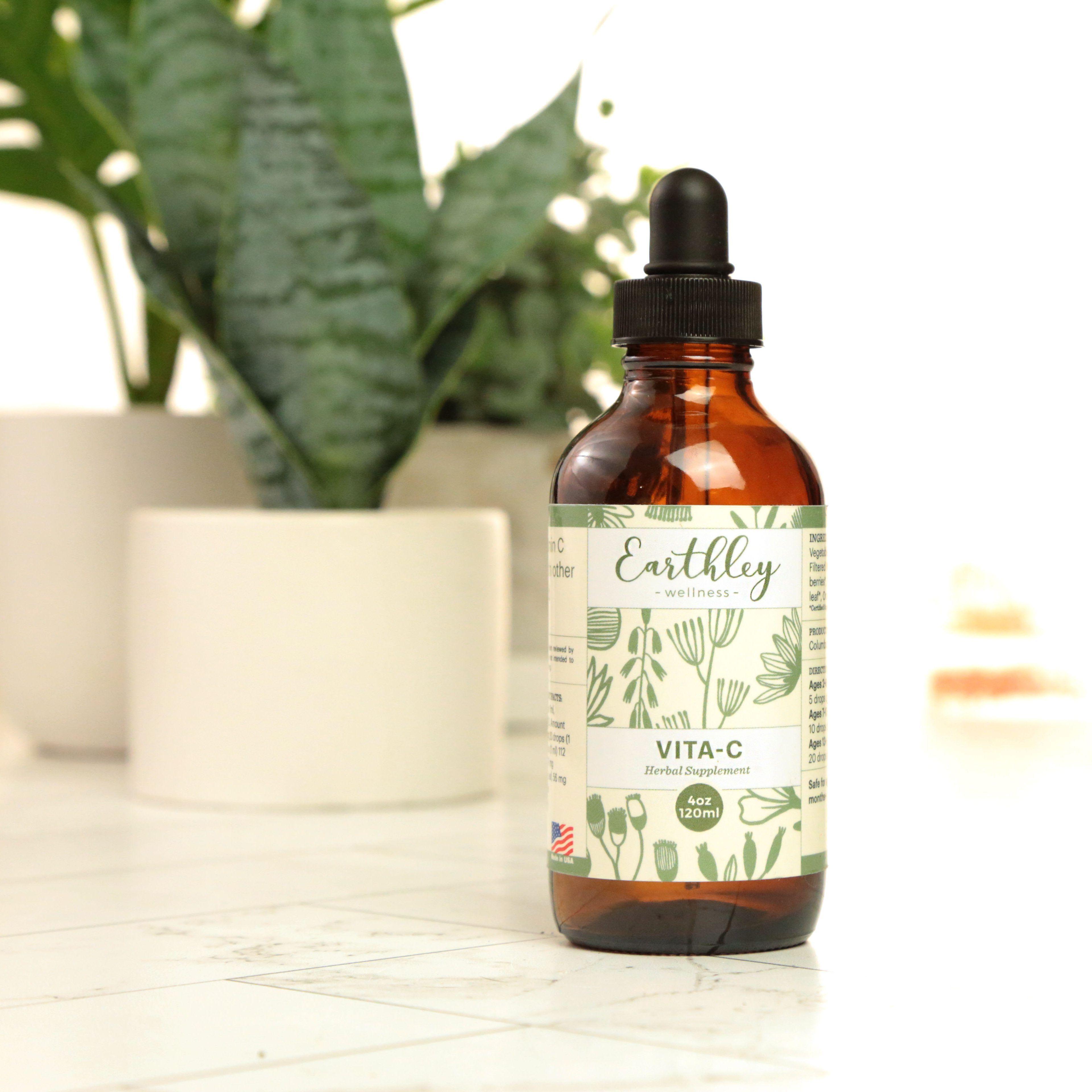Earthley Vita C herbal tincture amber dropper bottle with orange citrus label for vitamin C immune support